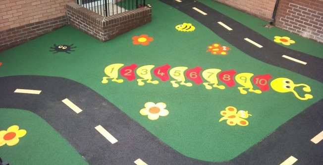 Rubber Safer Pour Surfacing in Adderley Green